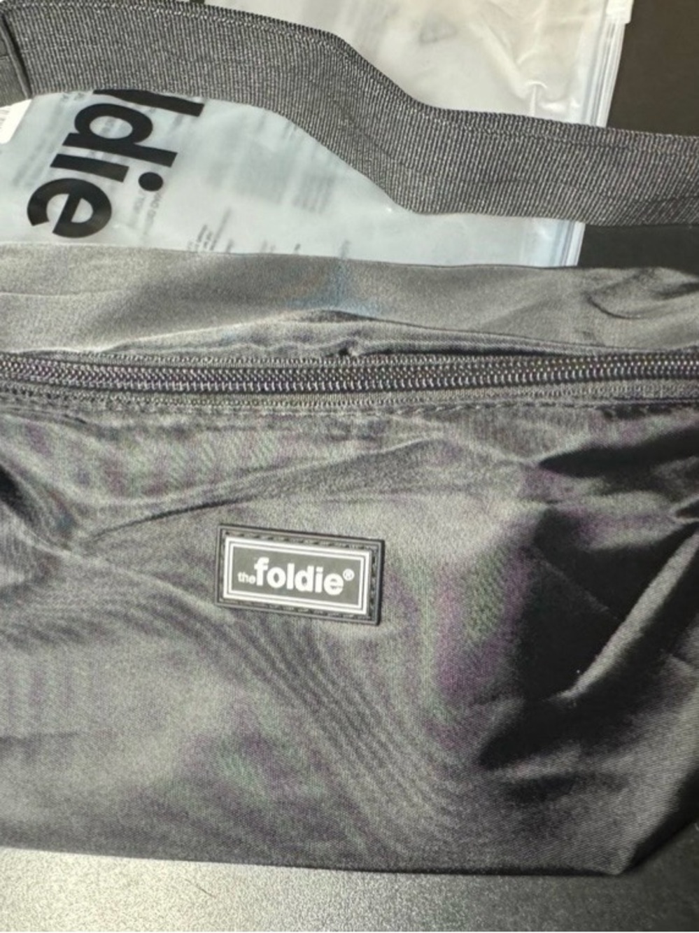 Foldie black crossbody bag